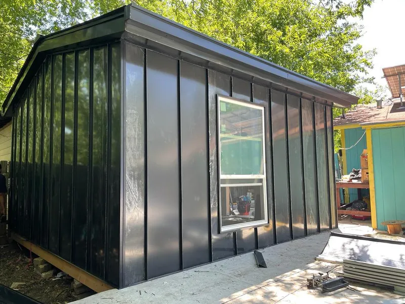 Black standing seam metal wall panels for Metal Roof Installation in Herkimer